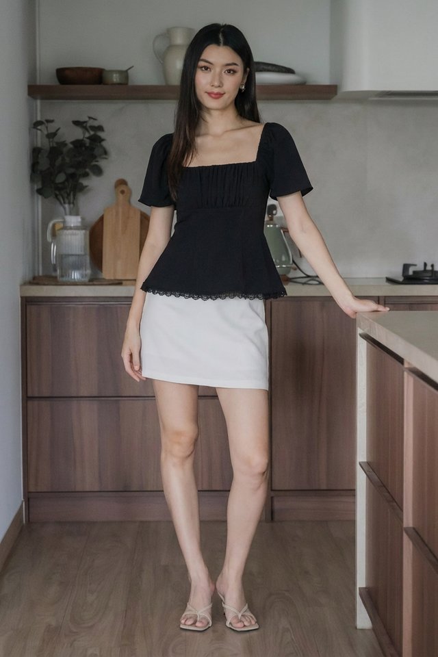 Liz Ruched Crochet Hem Top In Black