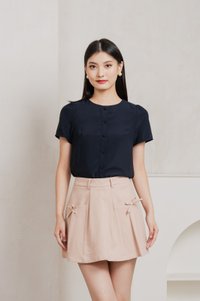 Quaint Coquette Pleated Skort In Dusty Pink