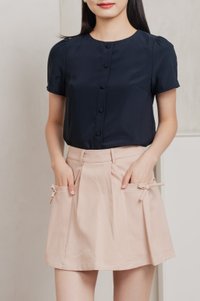 Quaint Coquette Pleated Skort In Dusty Pink