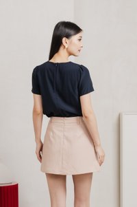 Quaint Coquette Pleated Skort In Dusty Pink