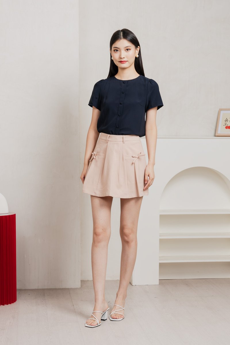 Quaint Coquette Pleated Skort In Dusty Pink