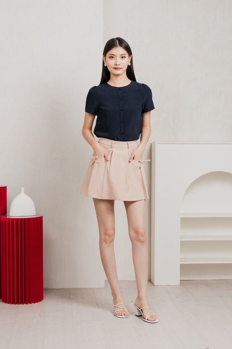 Quaint Coquette Pleated Skort In Dusty Pink