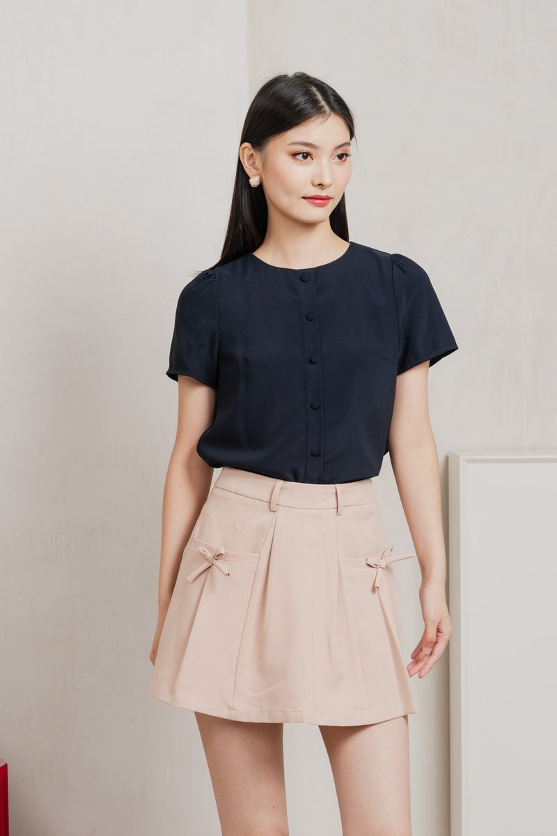 Quaint Coquette Pleated Skort In Dusty Pink