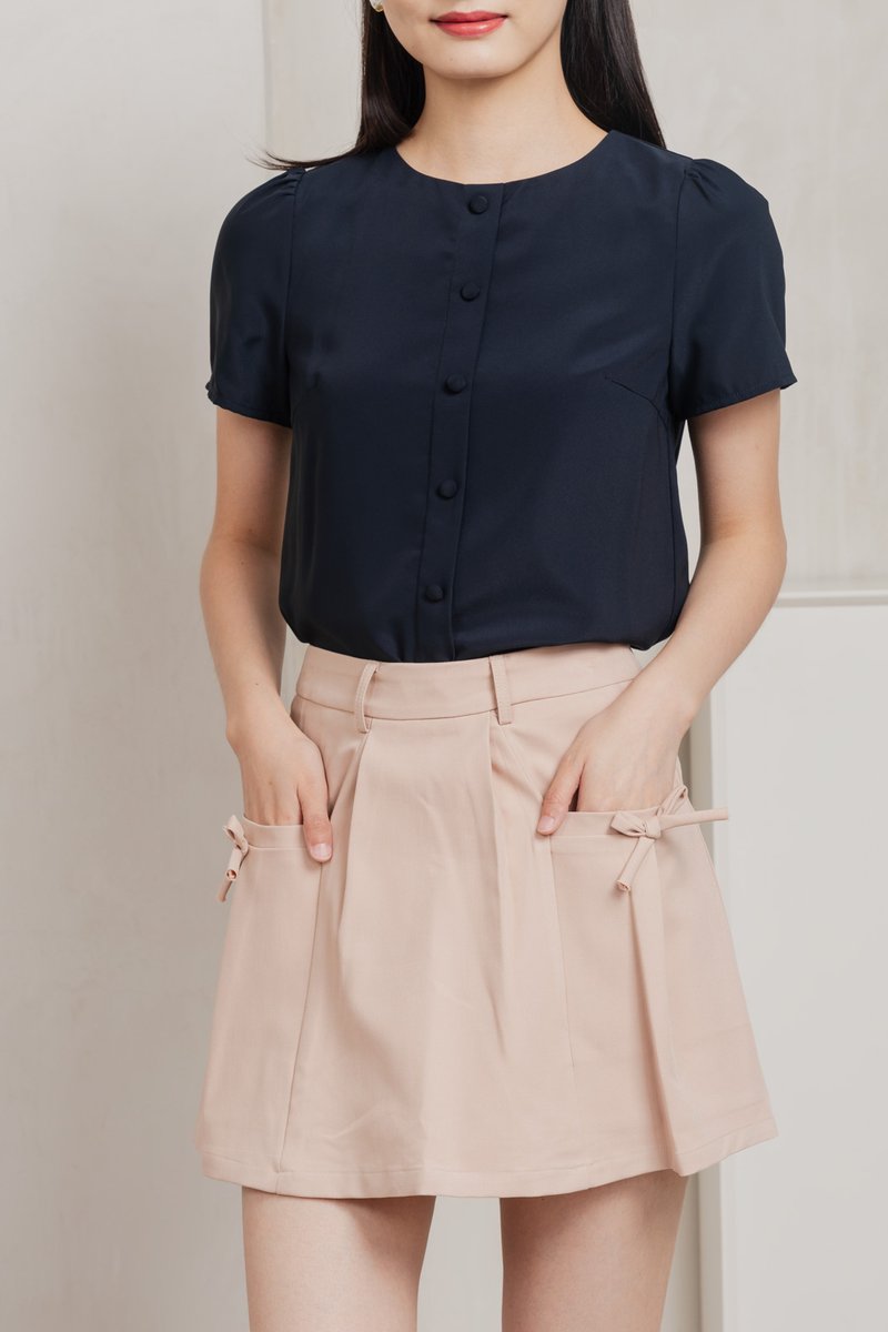 Quaint Coquette Pleated Skort In Dusty Pink