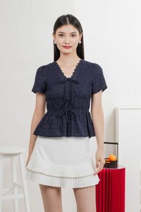 Aviva Eyelet Ribbon Top In Navy