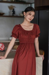 Margaret Ruched Ribbon Midi Dress In Brick Red