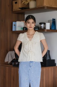 Austina Eyelet Ruffles Ribbon Top In Pearl Cream