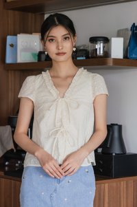 Austina Eyelet Ruffles Ribbon Top In Pearl Cream