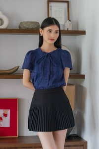Vanda Swiss Dot Ribbon Top In Navy