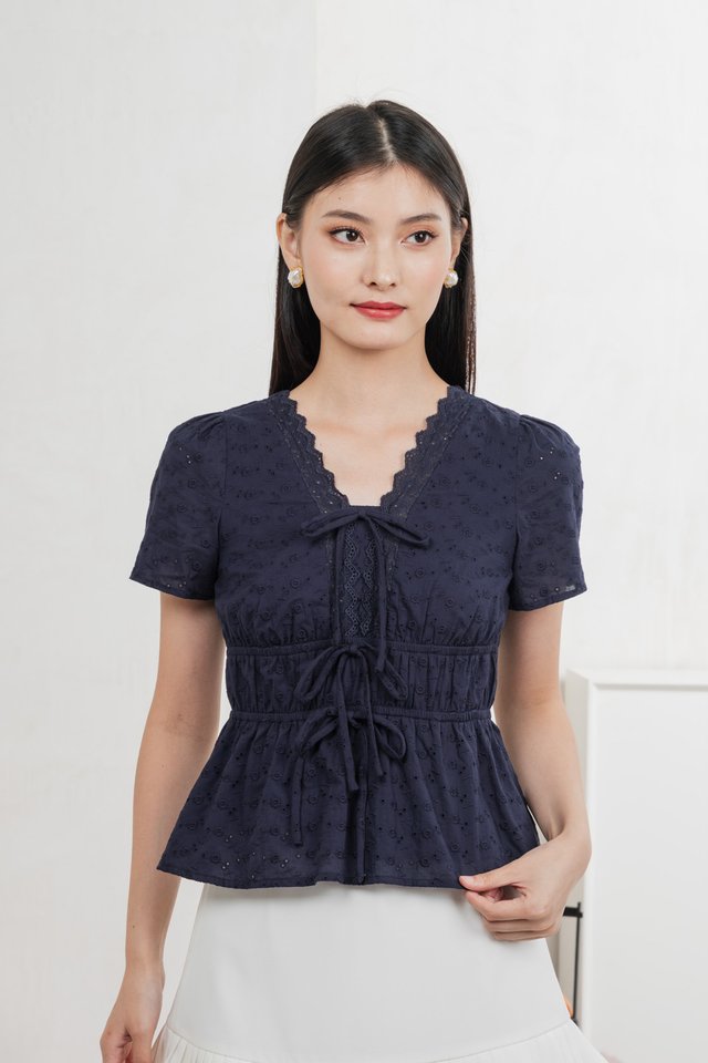 Aviva Eyelet Ribbon Top In Navy