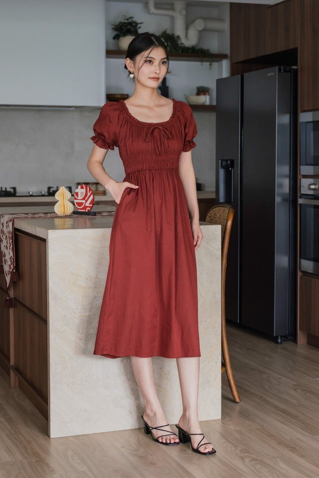Margaret Ruched Ribbon Midi Dress In Brick Red