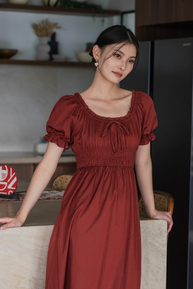 Margaret Ruched Ribbon Midi Dress In Brick Red