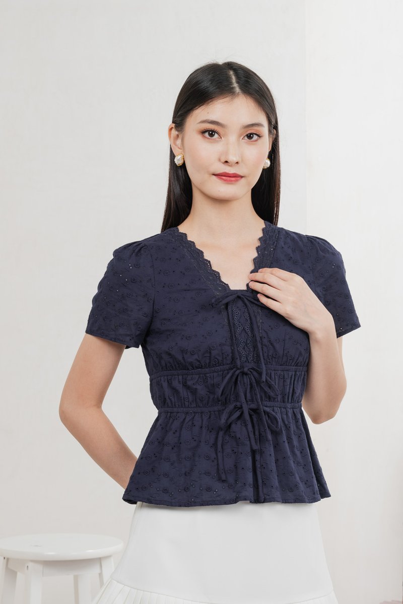 Aviva Eyelet Ribbon Top In Navy