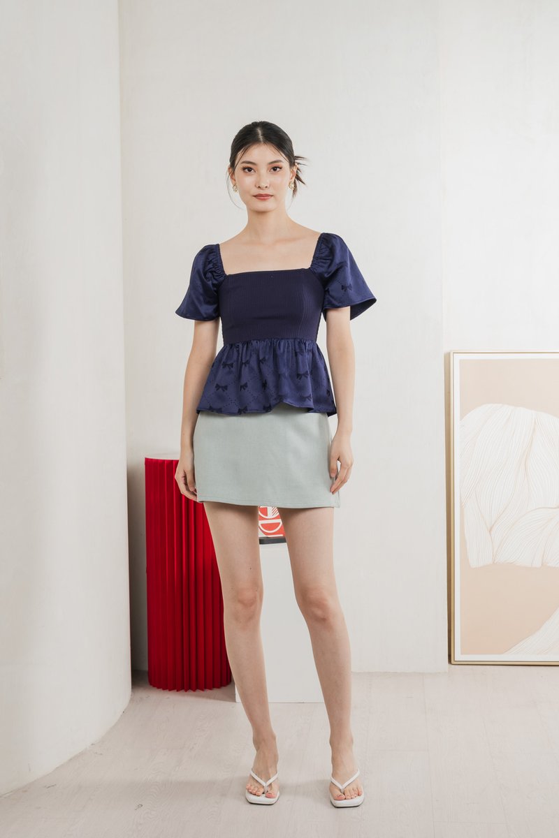 Marcelle Mixed Fabric Ribbon Texture Top In Navy