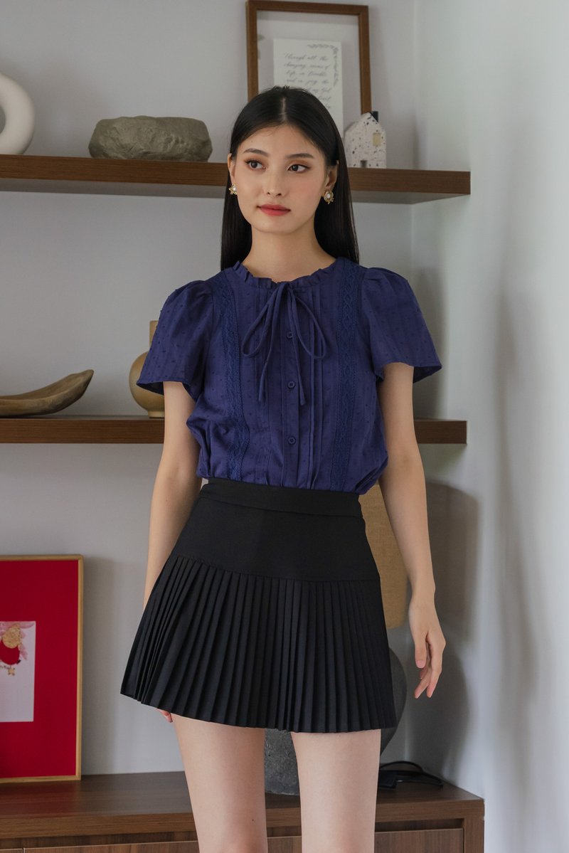 Vanda Swiss Dot Ribbon Top In Navy