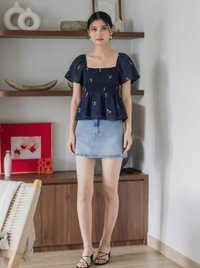 Cyra Floral Textured Smocked Top In Navy