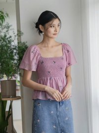Cyra Floral Textured Smocked Top In Pink