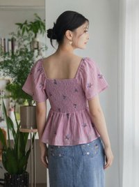 Cyra Floral Textured Smocked Top In Pink