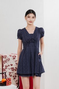 Rosewood Eyelet Ribbon Pleated Dress In Navy