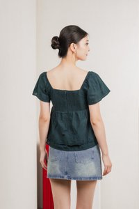 Paola Eyelet Bow Babydoll Top In Emerald