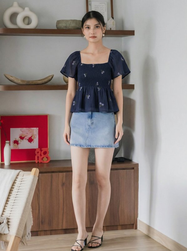 Cyra Floral Textured Smocked Top In Navy