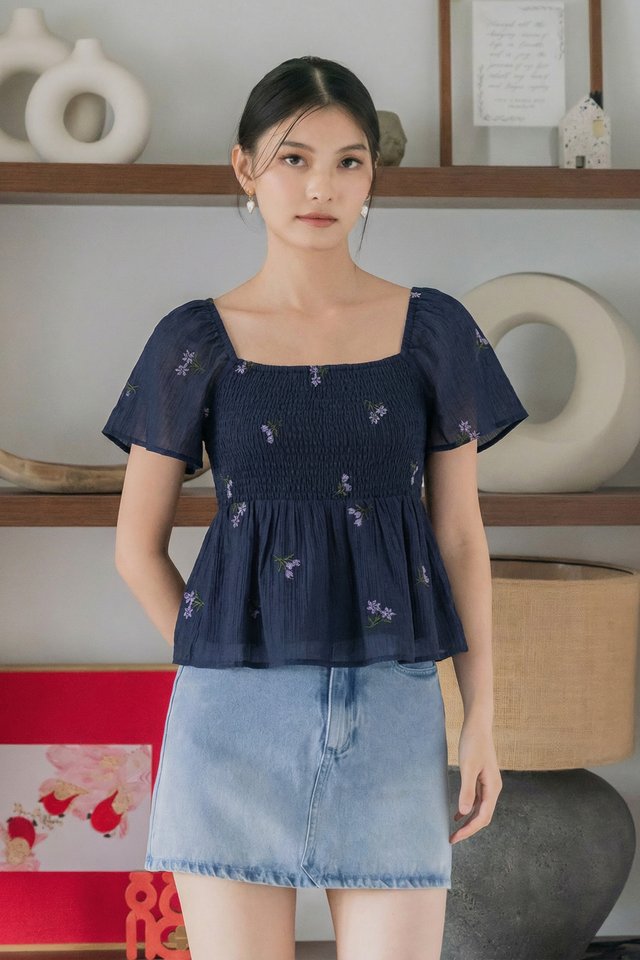 Cyra Floral Textured Smocked Top In Navy