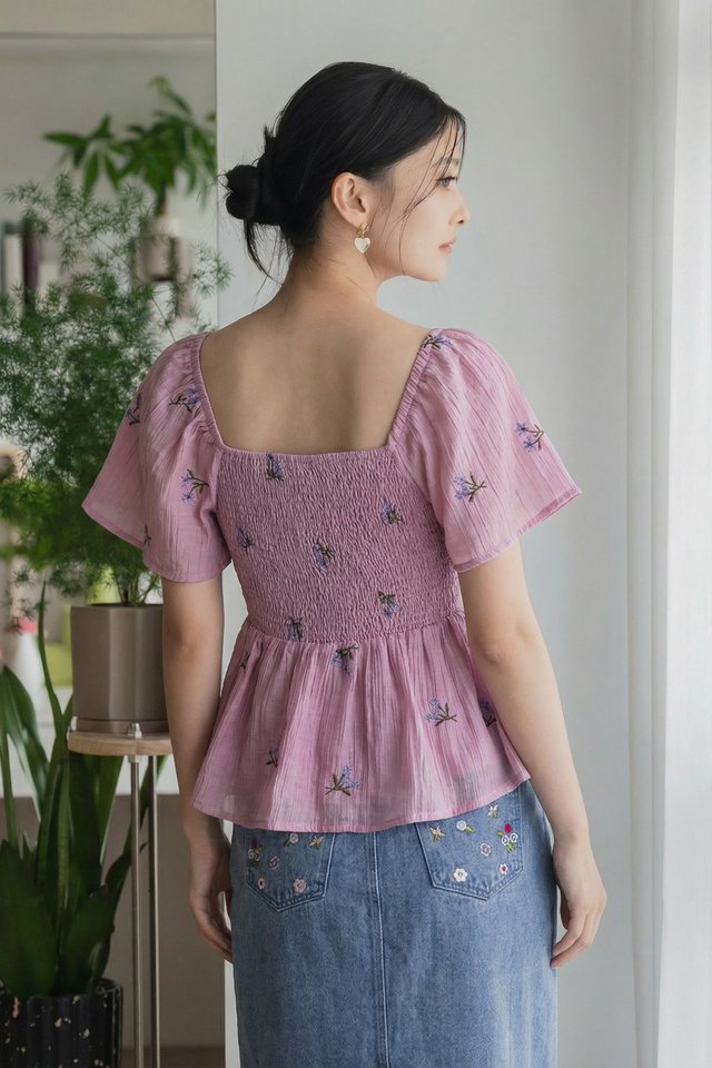 Cyra Floral Textured Smocked Top In Pink