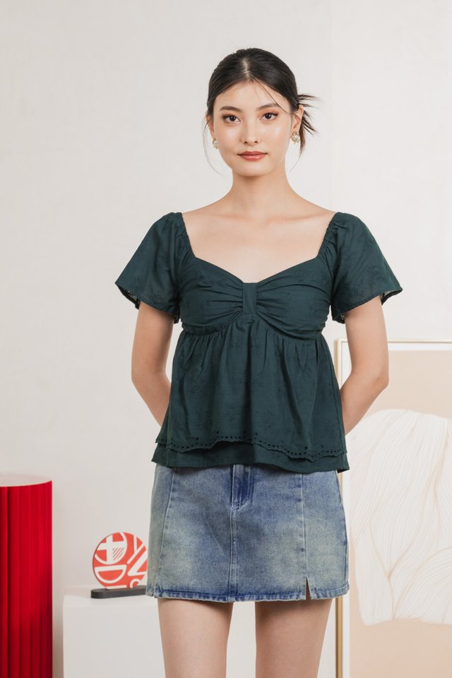 Paola Eyelet Bow Babydoll Top In Emerald