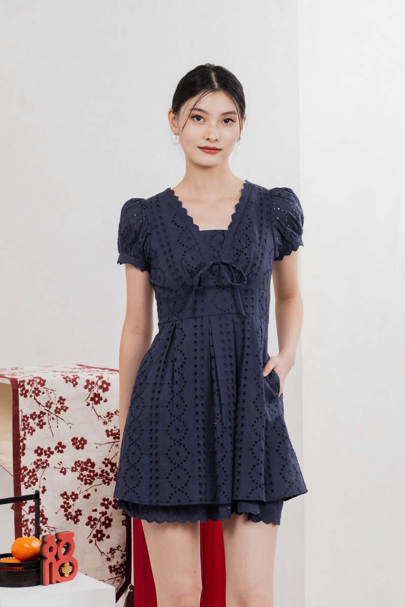 Rosewood Eyelet Ribbon Pleated Dress In Navy
