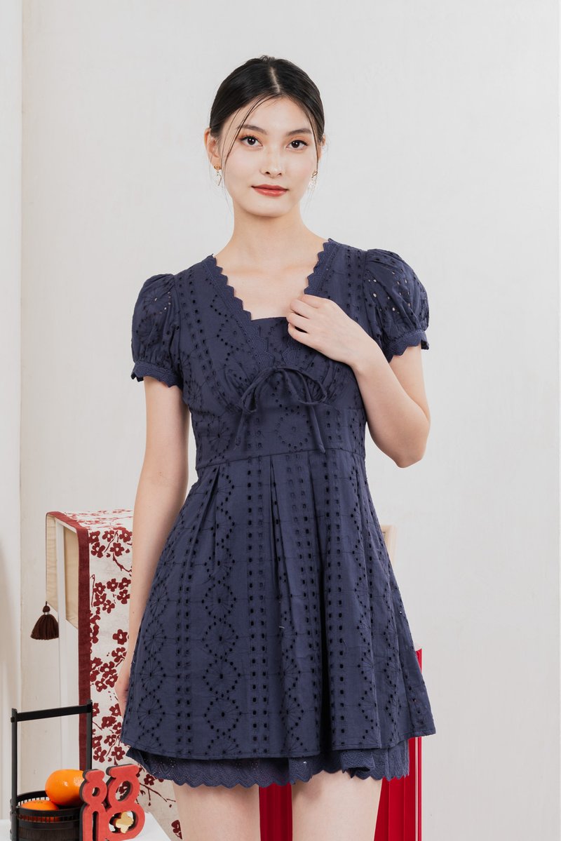 Rosewood Eyelet Ribbon Pleated Dress In Navy