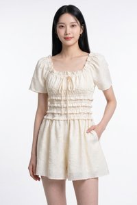 Bryce Smocked Ruffles Romper In Cream