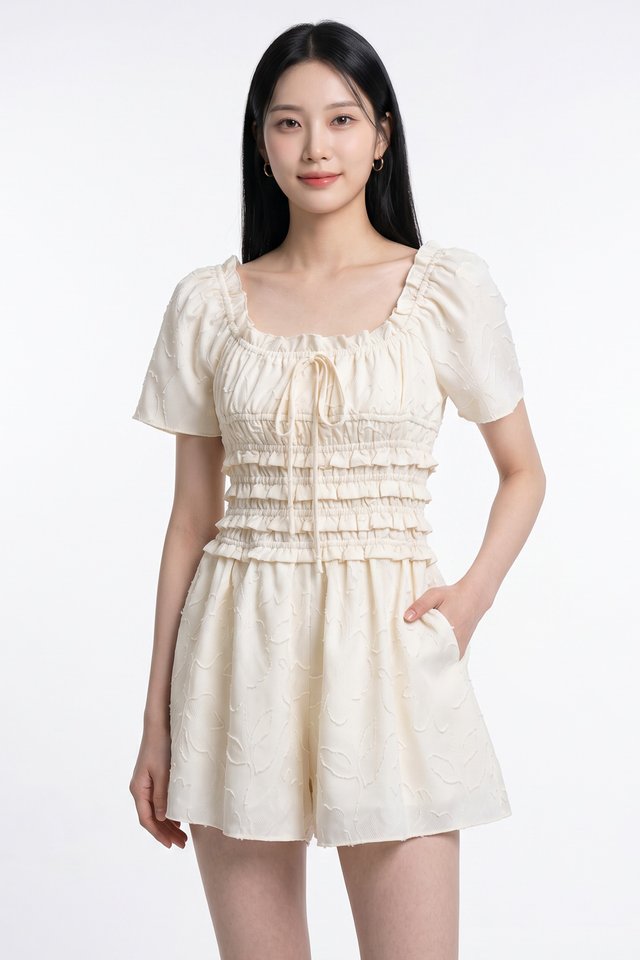 Bryce Smocked Ruffles Romper In Cream