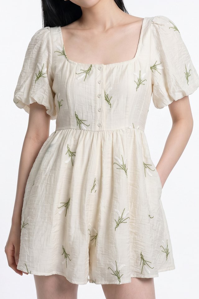 Nia Embroidered Floral Button Romper in Cream