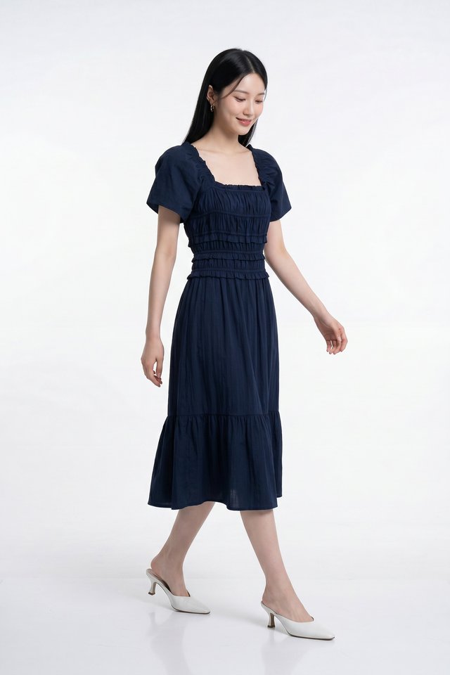 Maren Smocked Ruffles Midi Dress in Navy