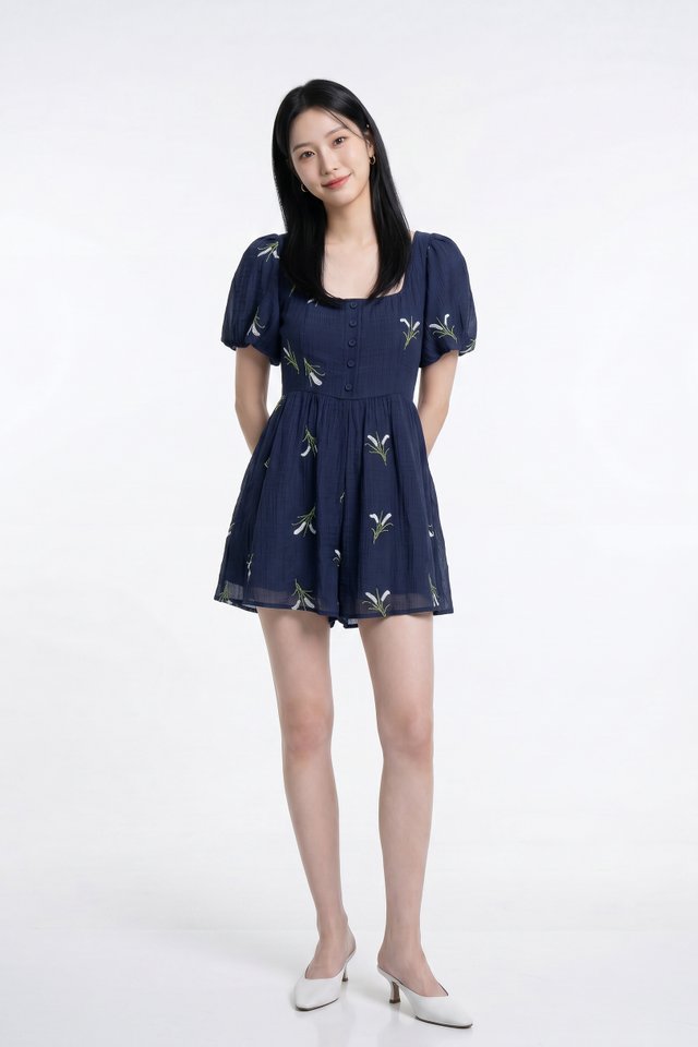 Nia Embroidered Floral Button Romper in Navy