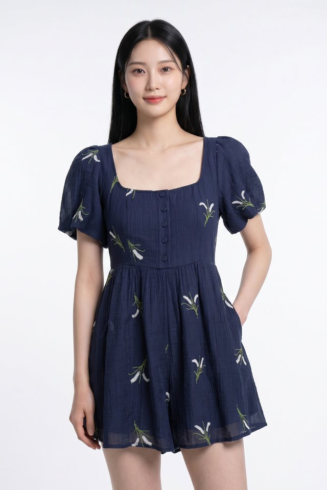 Nia Embroidered Floral Button Romper in Navy