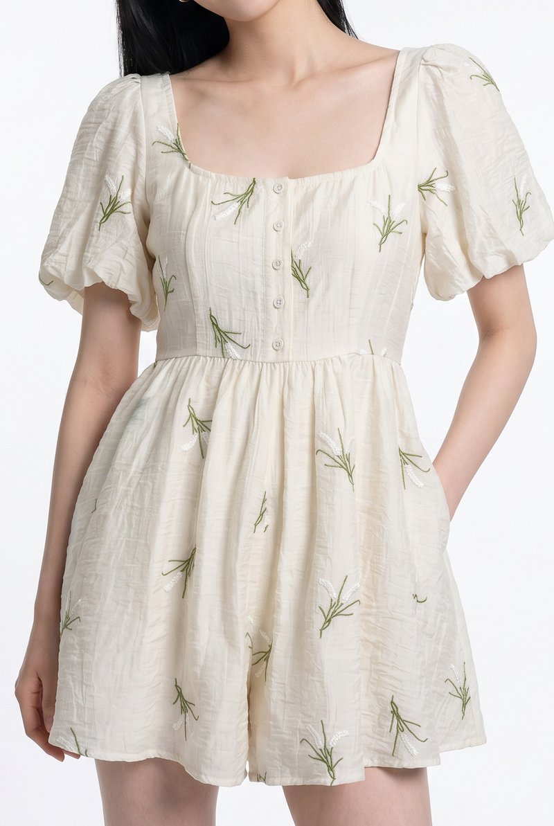 Nia Embroidered Floral Button Romper in Cream