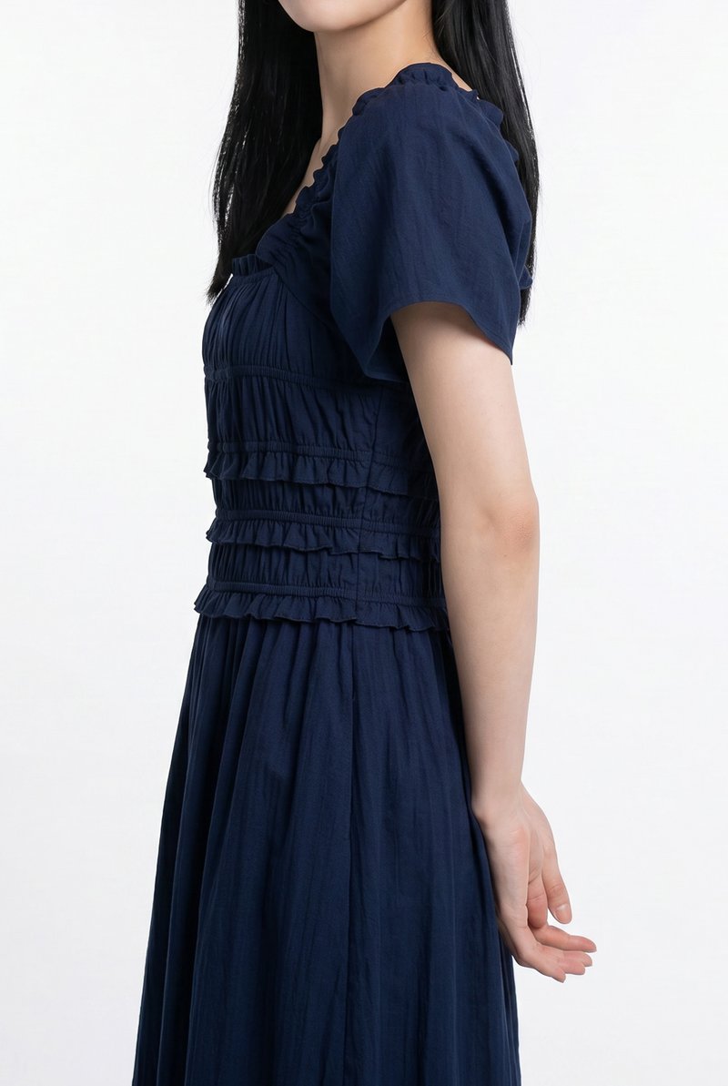 Maren Smocked Ruffles Midi Dress in Navy