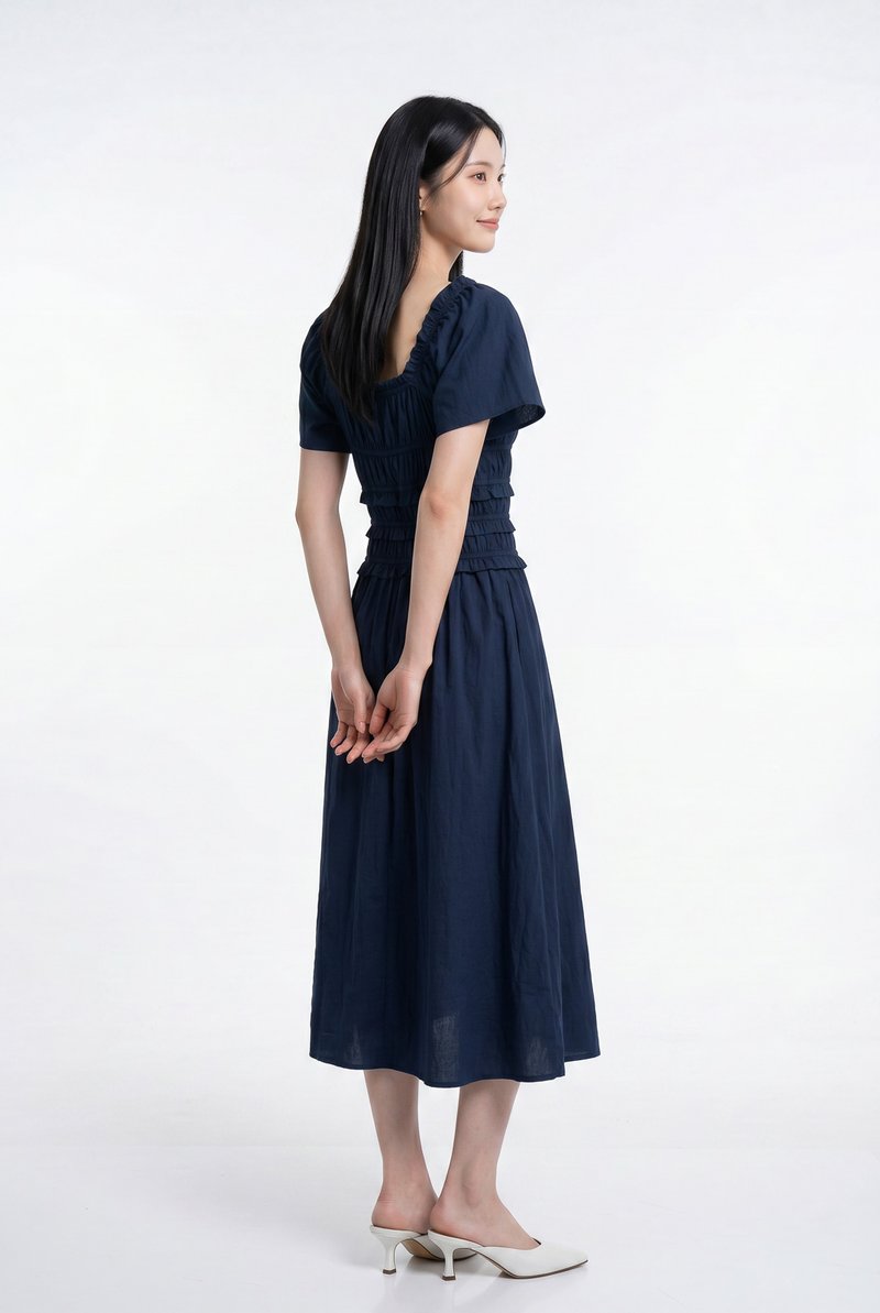 Maren Smocked Ruffles Midi Dress in Navy