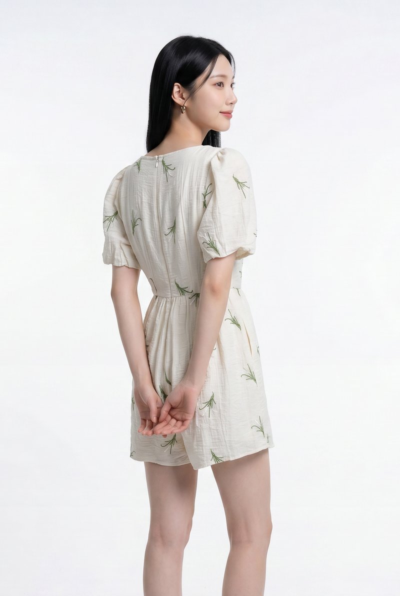 Nia Embroidered Floral Button Romper in Cream
