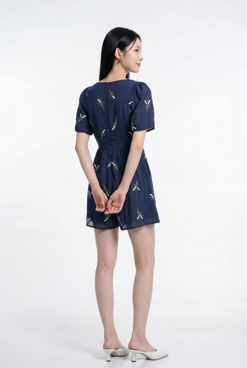 Nia Embroidered Floral Button Romper in Navy