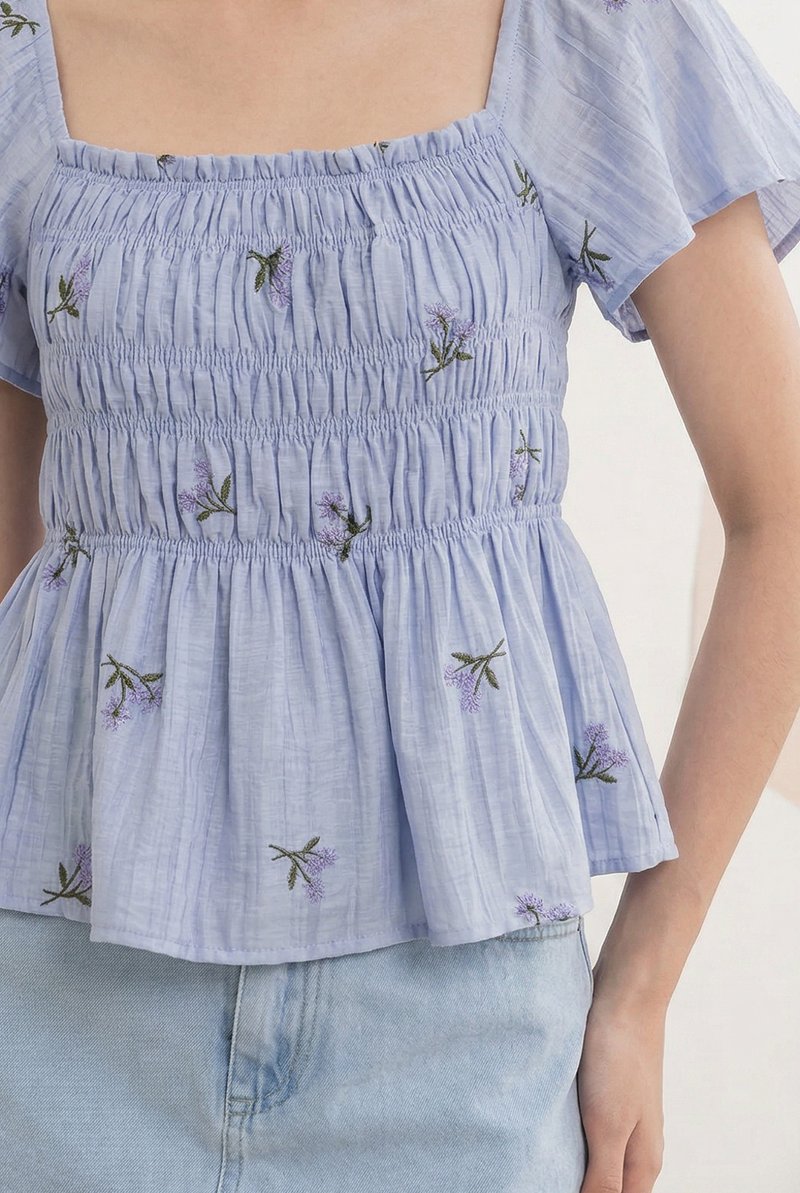Cyra Smocked Floral Top In Lavender(S)