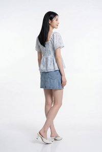 Kalena Ruched Lace Fleur Top In Blue