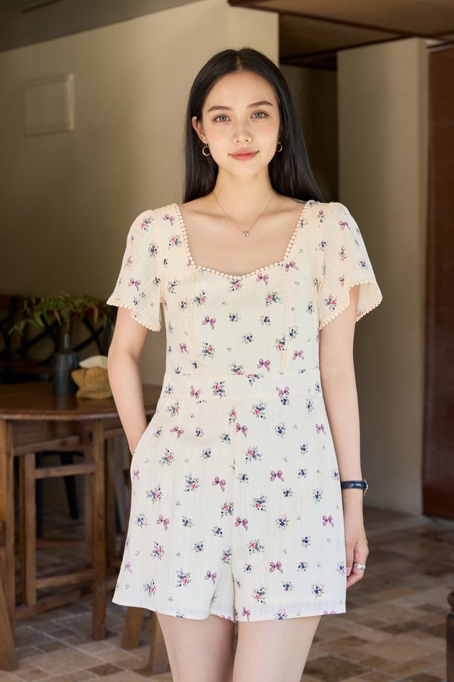 Thea Crochet Floral Romper In Cream