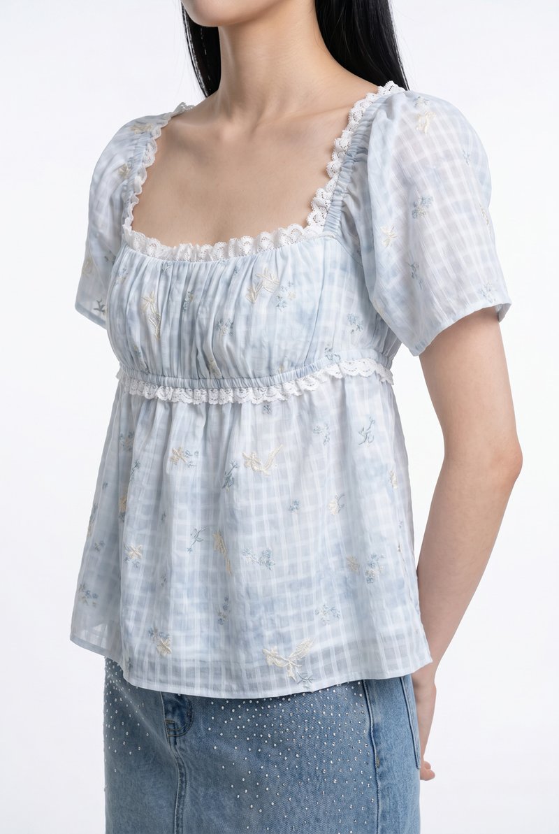 Kalena Ruched Lace Fleur Top In Blue