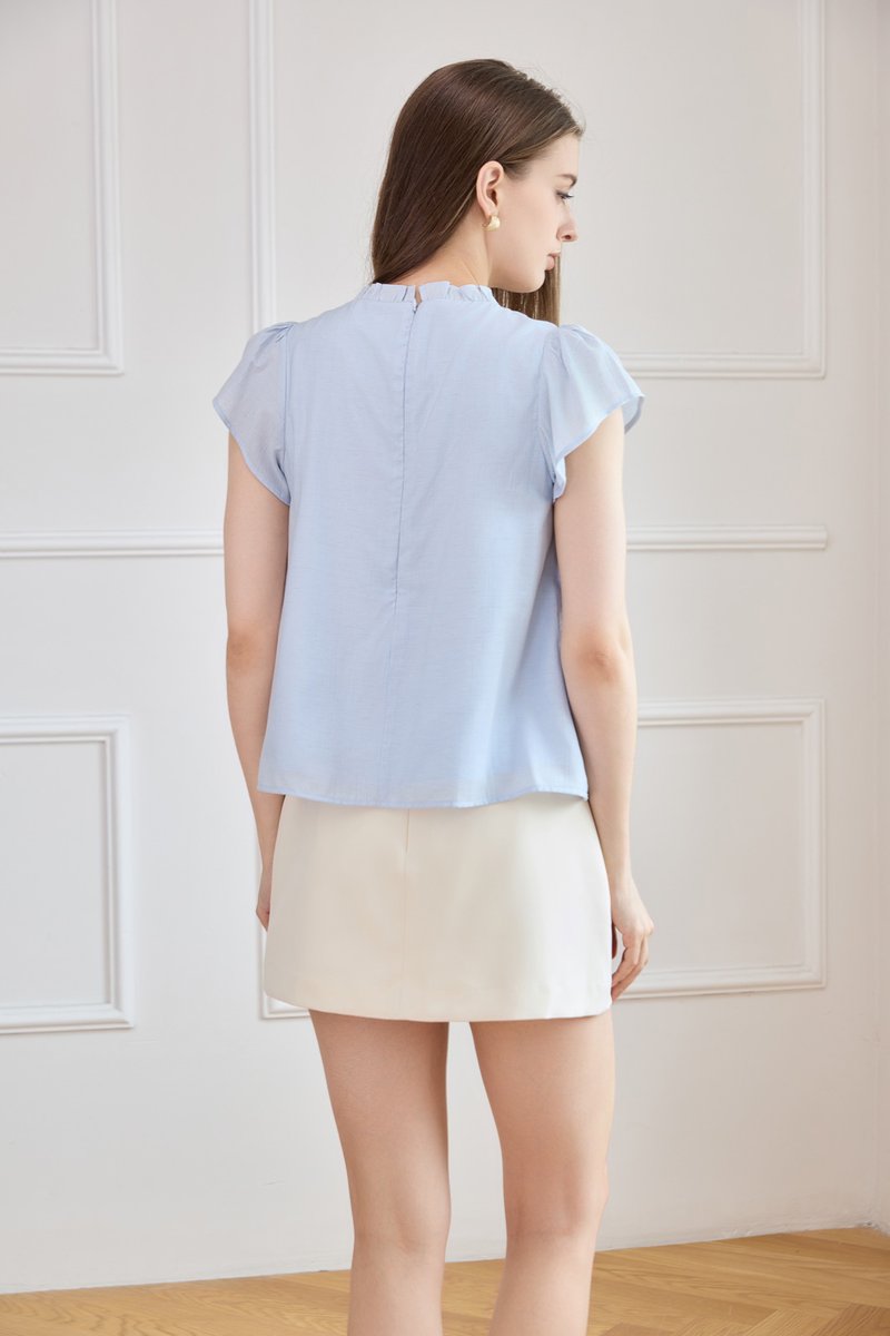 Ava Pleated Skort In Cream