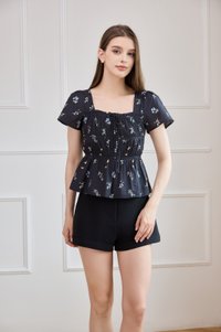 Greta Floral Peplum Top In Black