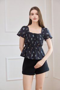 Greta Floral Peplum Top In Black