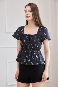 Greta Floral Peplum Top In Black