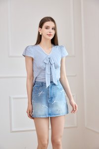 Alondra Denim Ribbon Rhinestone Skort in Mid Wash